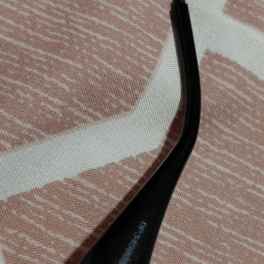 Miu Miu Gold Frame Sunglasses with Black Lenses
